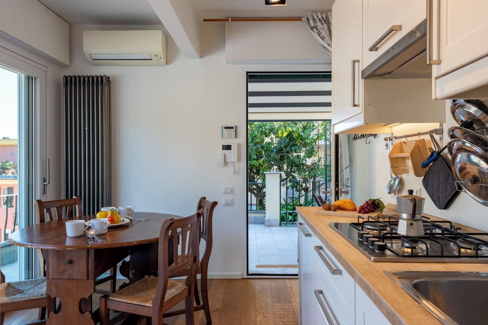Standard Apartment, Multiple Bedrooms (The Blue Window Apartment In) | Private kitchen | Microwave, stovetop, dishwasher, coffee/tea maker