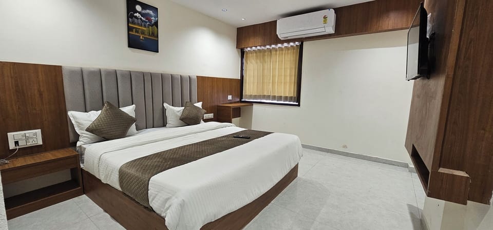 Deluxe Double Room, City View | In-room safe, desk, laptop workspace, iron/ironing board