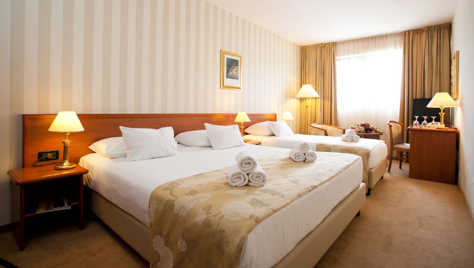 Standard Triple Room, 1 Bedroom | Premium bedding, minibar, in-room safe, desk