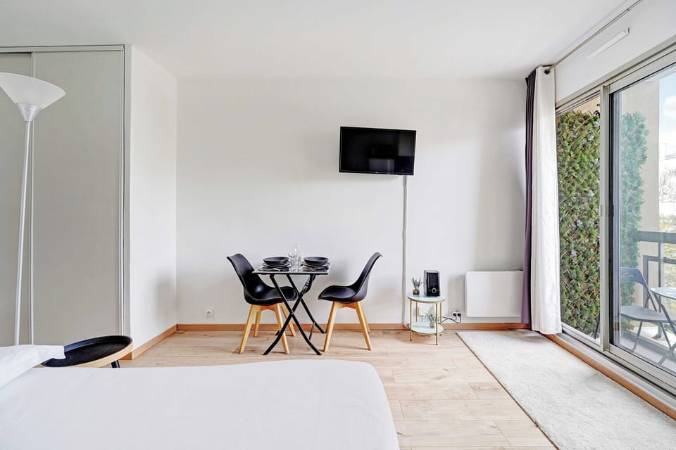 Apartment | Laptop workspace, iron/ironing board, bed sheets