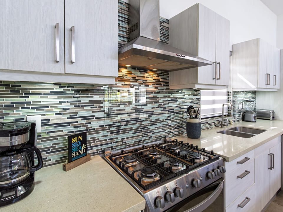 Superior Villa | Private kitchen | Toaster, cleaning supplies