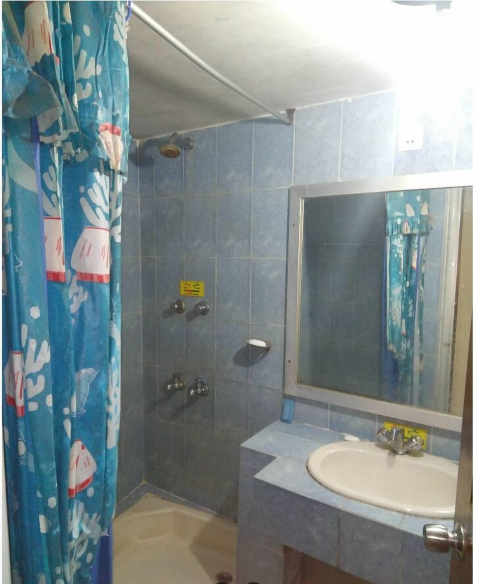 Bathtub, free toiletries, towels, soap