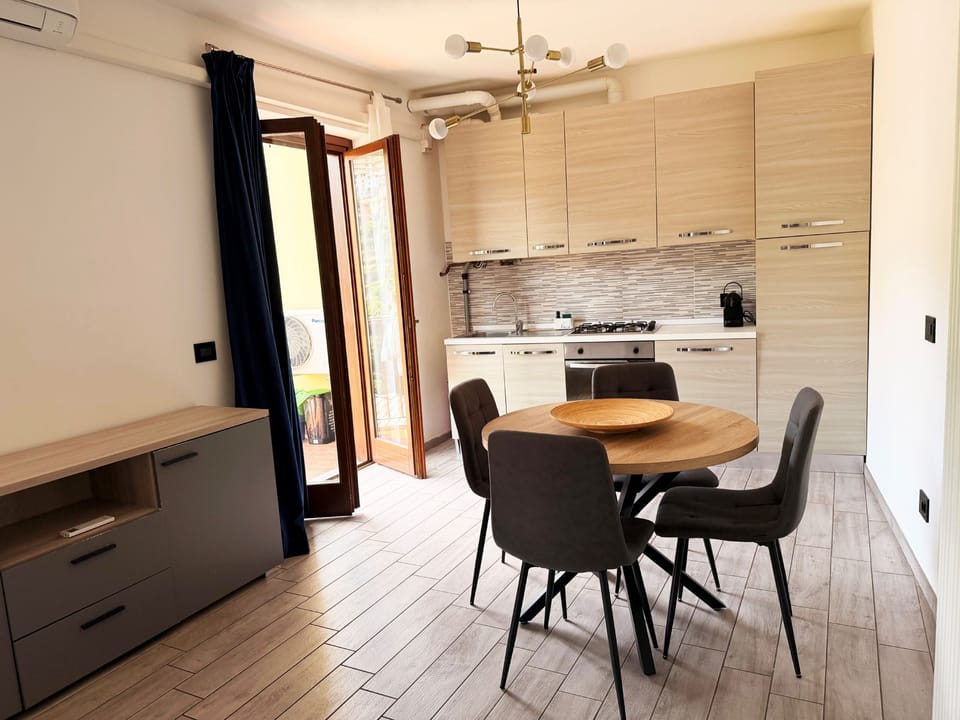 Family Apartment | Living area | Flat-screen TV