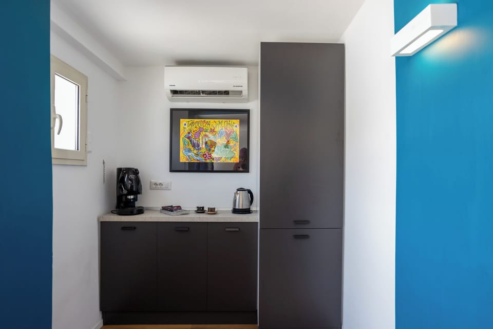 Apartment (1 Bedroom) | Private kitchen | Espresso maker, stovetop, electric kettle, cookware/dishes/utensils