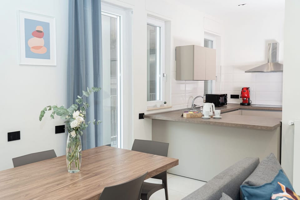 Apartment (2 Bedrooms) | Living area | 32-inch flat-screen TV with cable channels