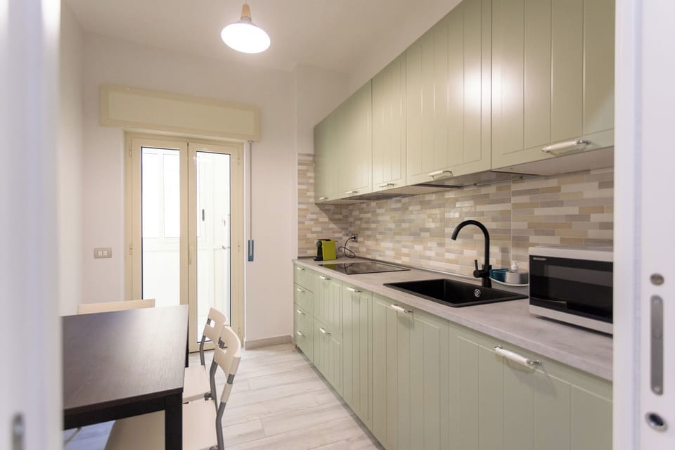 Apartment (1 Bedroom) | Private kitchen | Espresso maker, microwave, stovetop, dishwasher