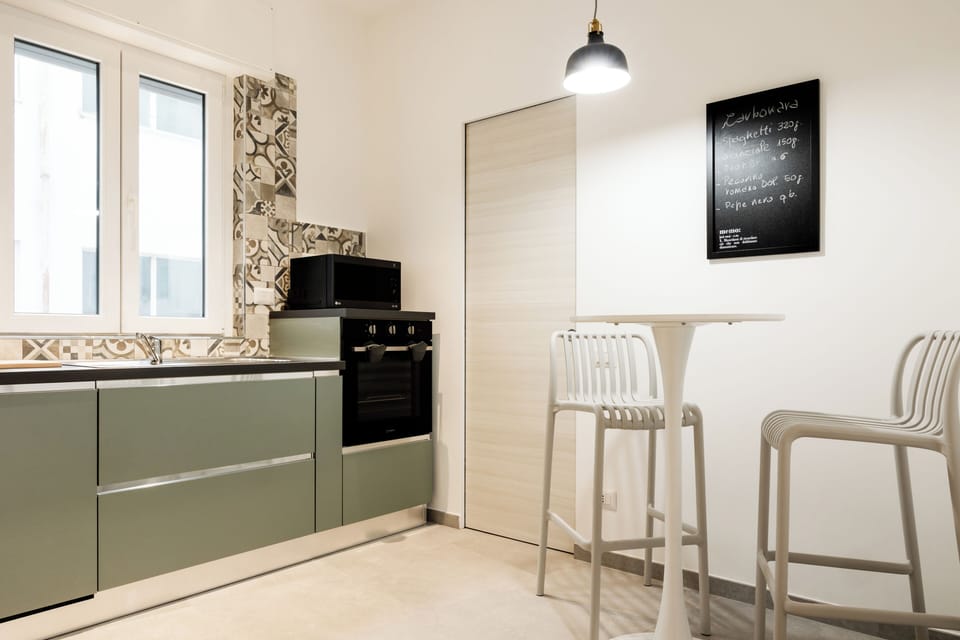 Apartment (2 Bedrooms) | Private kitchen | Microwave, oven, stovetop, dishwasher