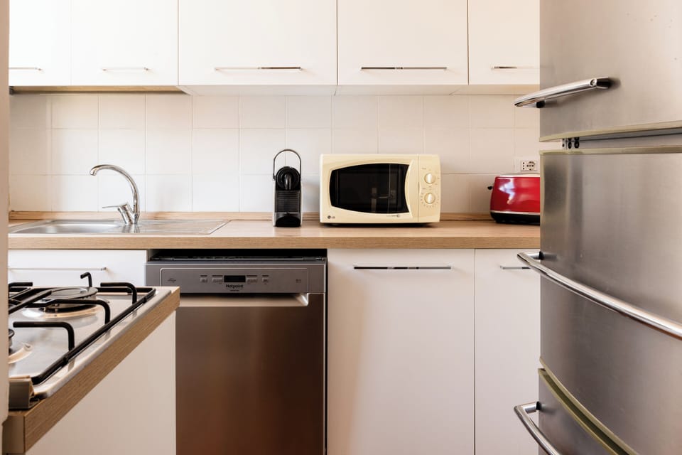 Apartment (1 Bedroom) | Private kitchen | Microwave, stovetop, espresso maker, electric kettle