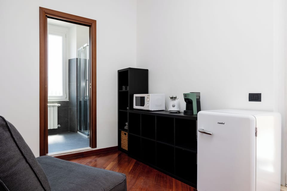 Apartment (1 Bedroom) | Living area | 32-inch Smart TV with cable channels