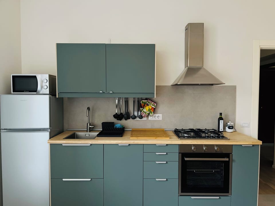 Apartment (2 Bedrooms) | Private kitchen | Microwave, oven, stovetop, dishwasher