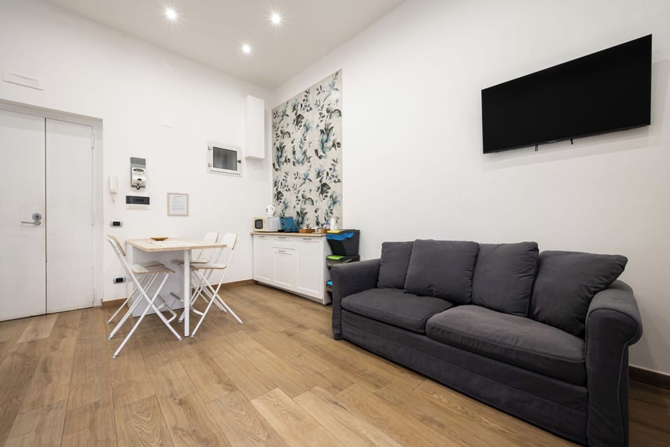 Apartment (1 Bedroom) | Living area | TV