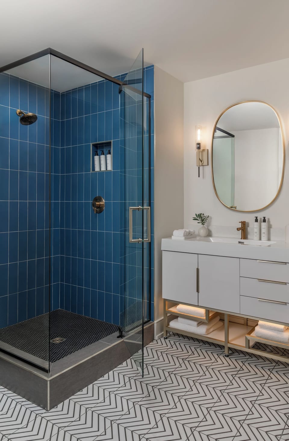 Shower, rainfall showerhead, designer toiletries, towels