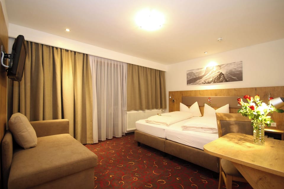 Standard Triple Room, Balcony, Mountain View | In-room safe, blackout drapes, free WiFi, bed sheets