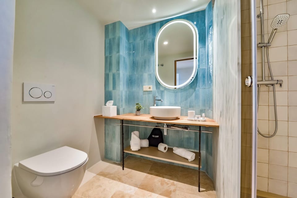 Superior Double Room, Sea View | Bathroom | Shower, hair dryer, towels, soap