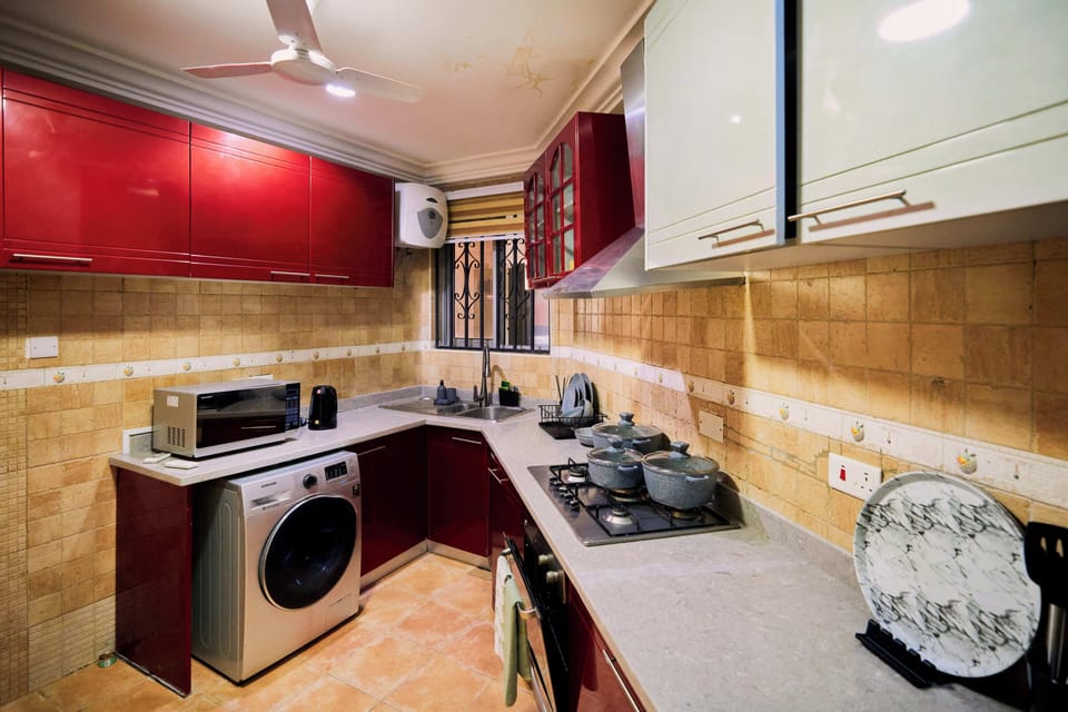 Apartment | Private kitchen | Full-size fridge, microwave, oven, stovetop