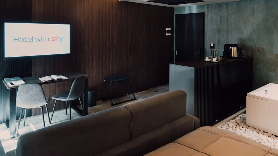 Camera King con Vasca Idromassaggio | Minibar, in-room safe, desk, soundproofing