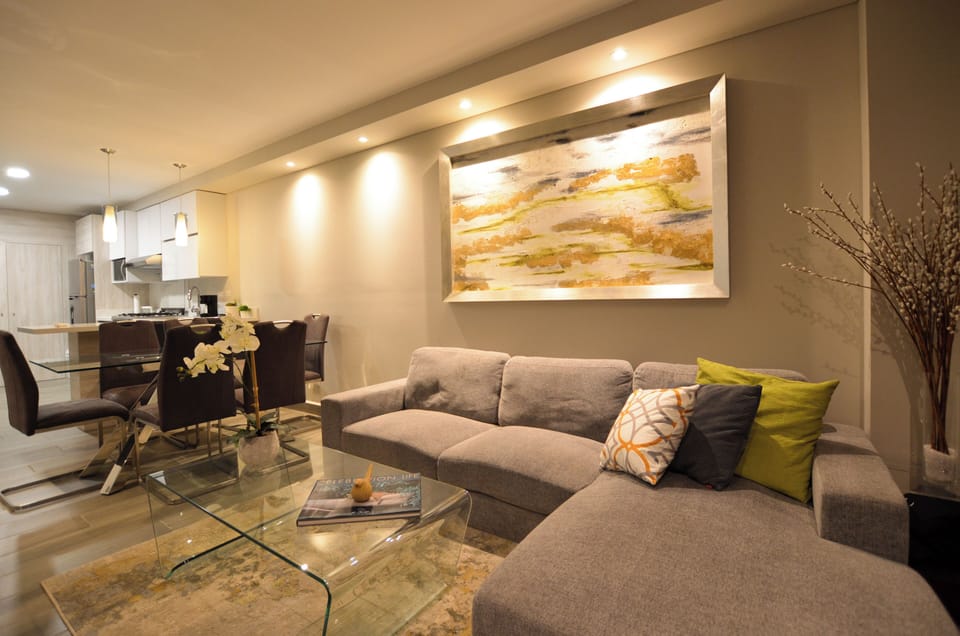 Suite, City View | Living area | 60-inch Smart TV with digital channels, streaming services