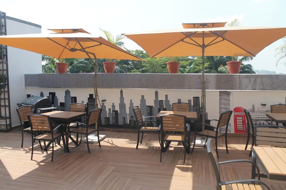 Deluxe Apartment, Balcony, City View | Outdoor dining