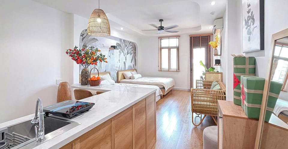 Family Studio Suite, Balcony, City View | Desk, free WiFi