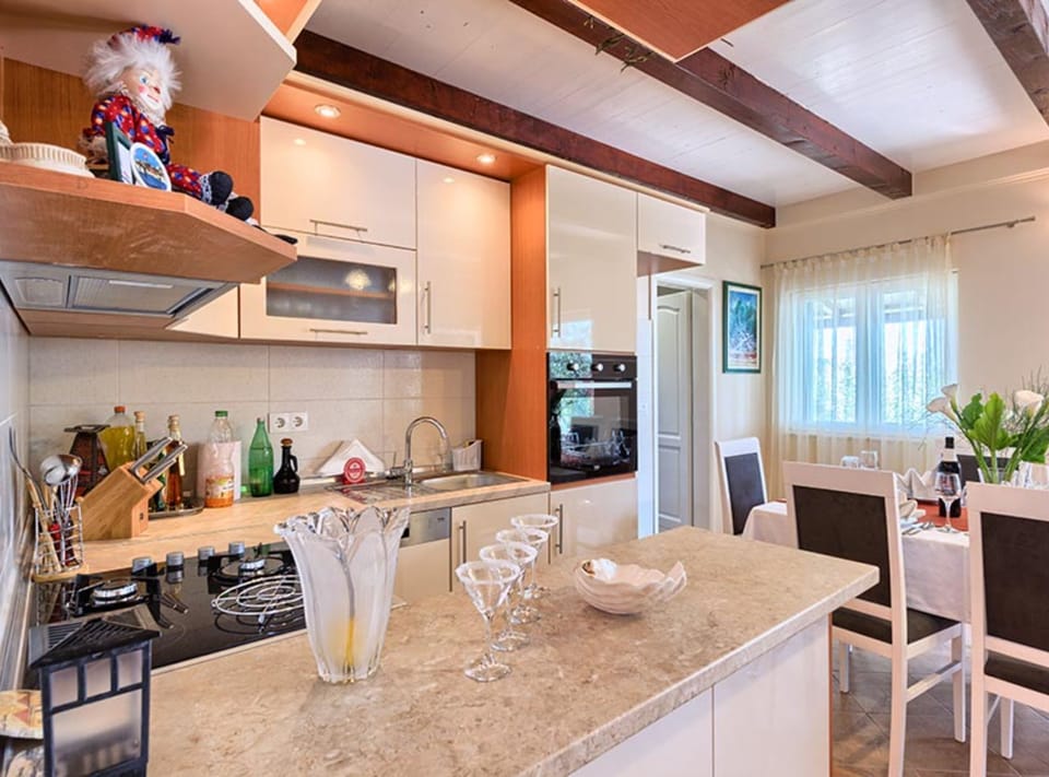 Villa (FourBedroom Beachfront Villa with Poo) | Private kitchen | Fridge