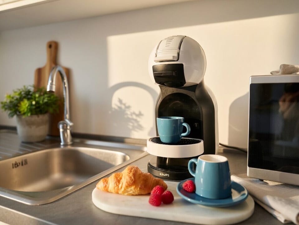 Deluxe Penthouse, Courtyard View | Coffee and/or coffee maker