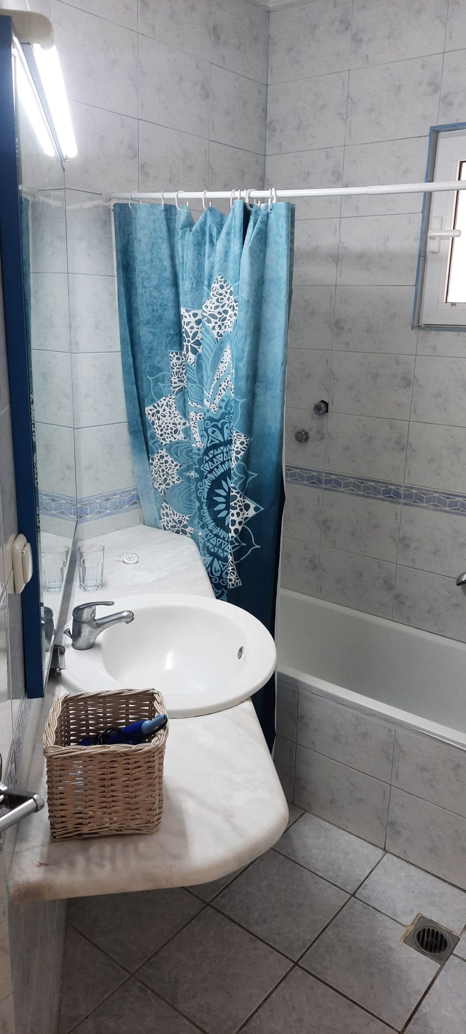 Bathtub, hair dryer, towels, soap