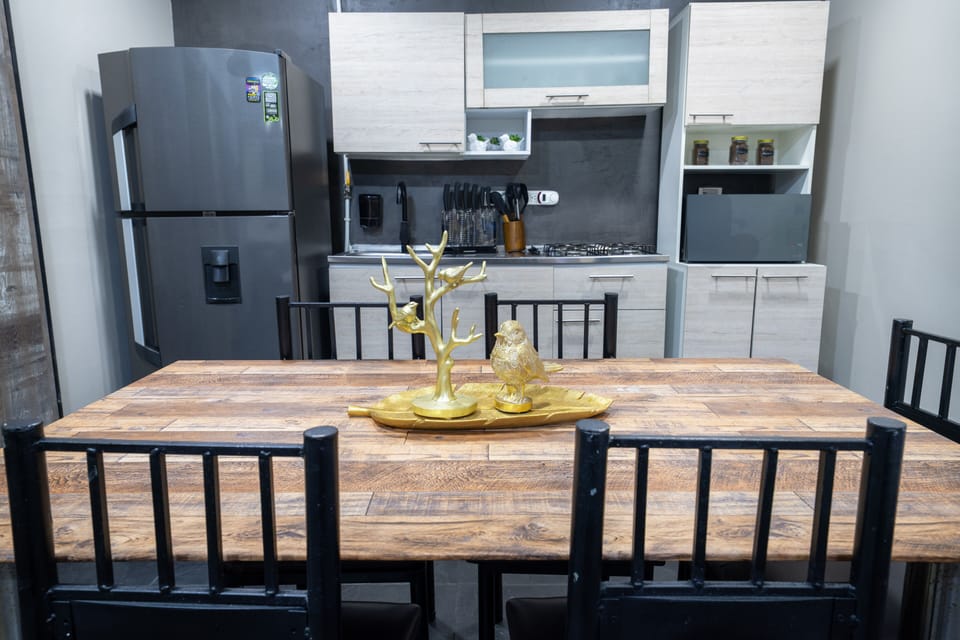 Standard Apartment, City View | Private kitchenette | Dining tables