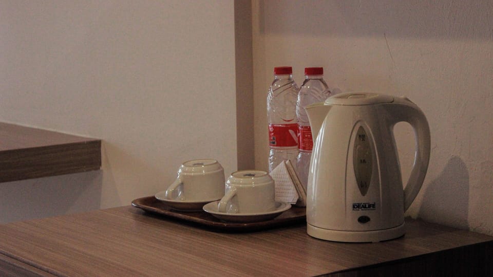 Deluxe Room | Coffee and/or coffee maker
