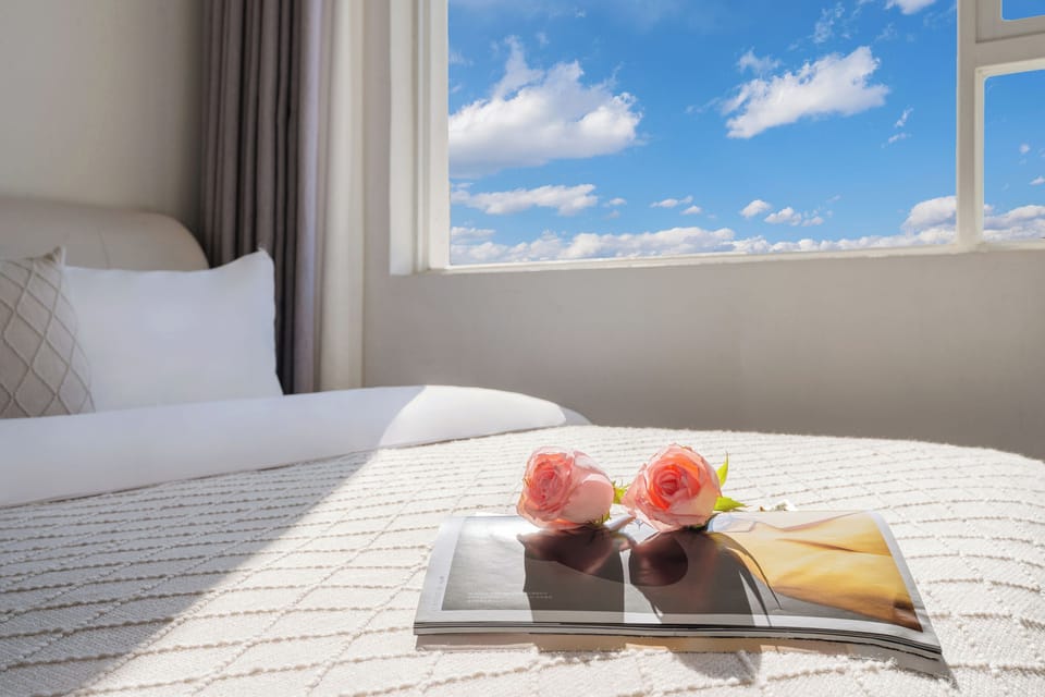 Family Triple Room, Courtyard View | Desk, laptop workspace, blackout drapes, soundproofing