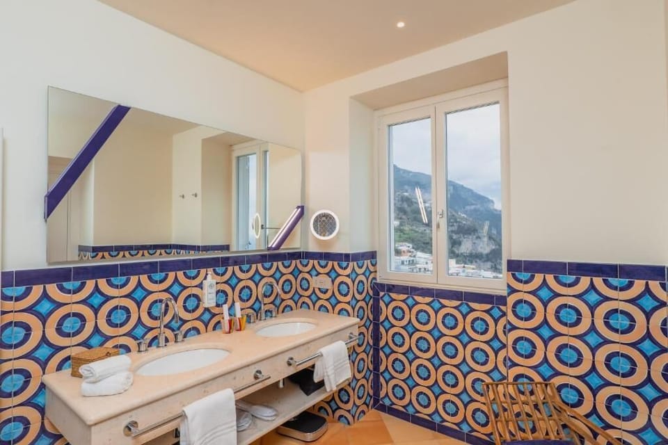 Superior Double Room, Balcony, Sea View | Bathroom | Shower, rainfall showerhead, designer toiletries, hair dryer
