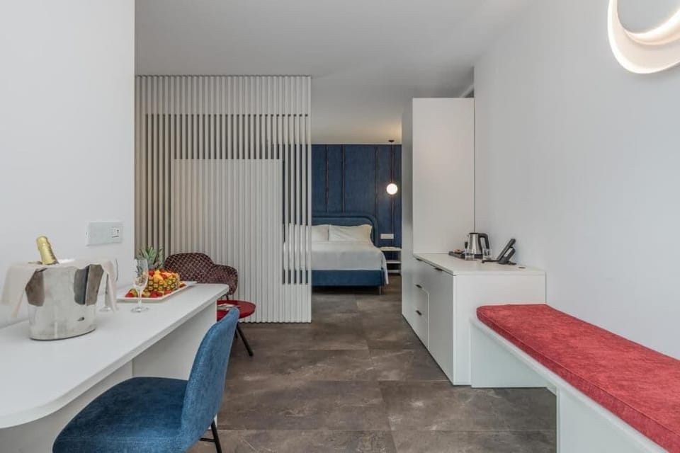 Suite, Balcony, Pool View | In-room safe, desk, blackout drapes, soundproofing