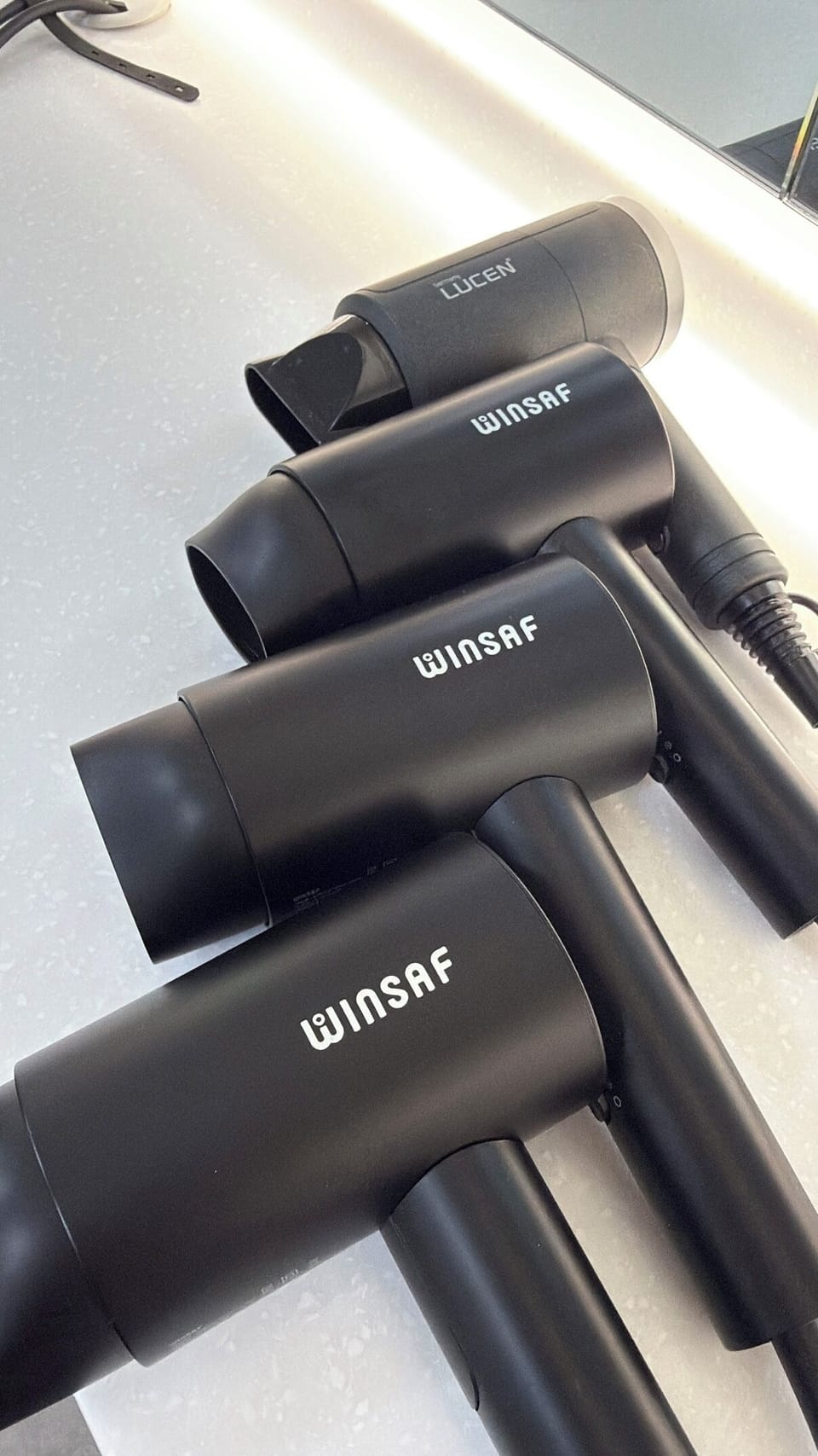 Shower, hair dryer, towels, shampoo