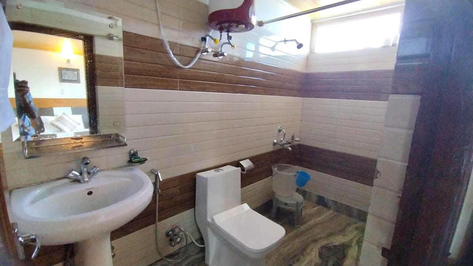 Shower, rainfall showerhead, towels, soap
