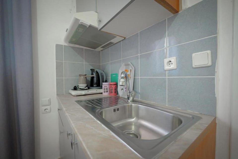 Classic Triple Room | Private kitchen