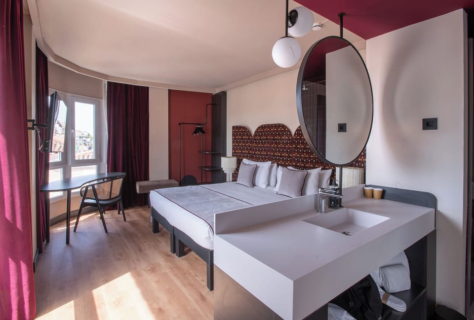 Premium Room (with views) | Down comforters, memory foam beds, desk, blackout drapes
