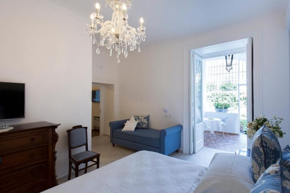 Deluxe Triple Room, Balcony, Garden View | Interior