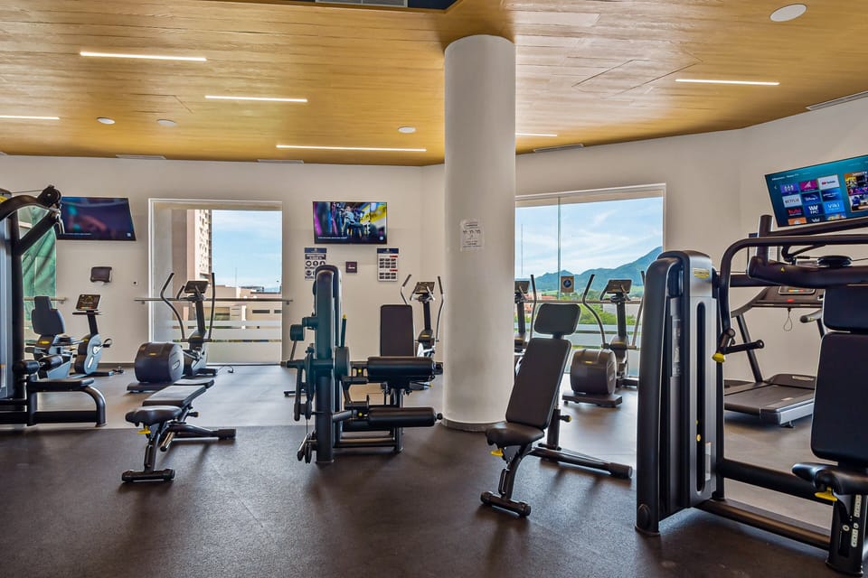 Bright Oceanfront Condo With Balcony, Rooftop Pool & Near Malecon Boardwalk Apartment in Puerto Vallarta