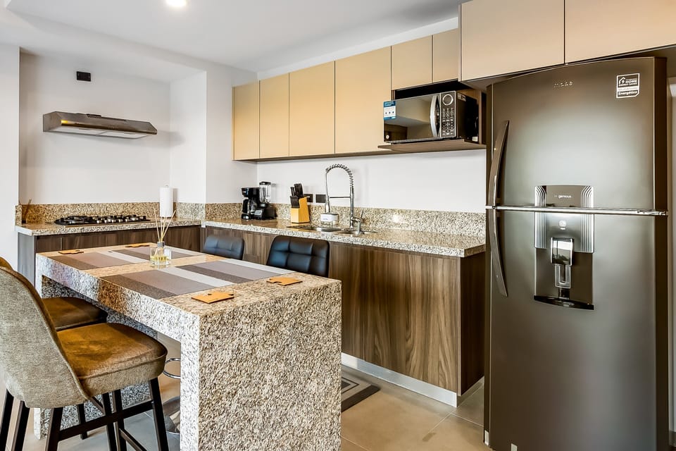 Condo, 1 King Bed with Sofa bed, Balcony, Pool View (DUVA, Unit 105) | Private kitchen