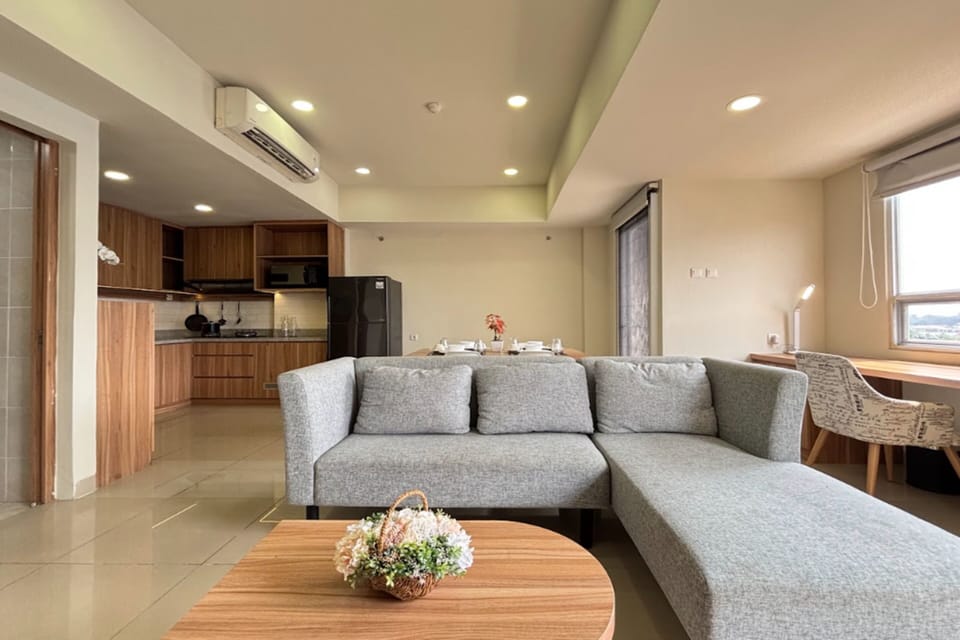 Premier Suite, 2 Bedrooms, Balcony, City View | Living area | 32-inch LED TV with cable channels