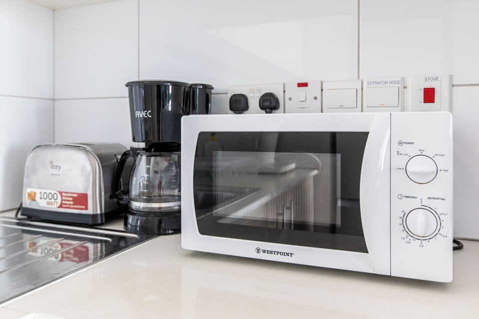 Apartment, 2 Bedrooms, Kitchen, City View | Private kitchen | Coffee/tea maker, full-size fridge, microwave, oven