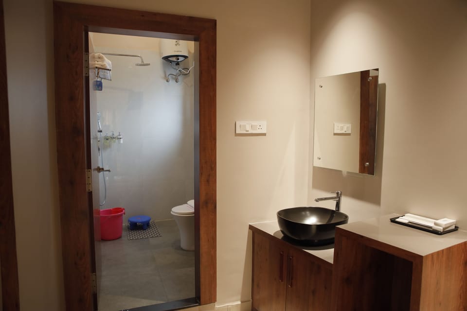 Deluxe Double Room, City View | Bathroom | Shower, free toiletries, towels, soap