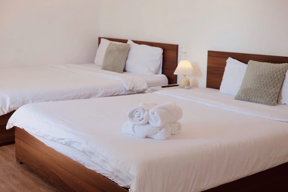Family Quadruple Room, City View | Desk, blackout drapes, iron/ironing board, free WiFi