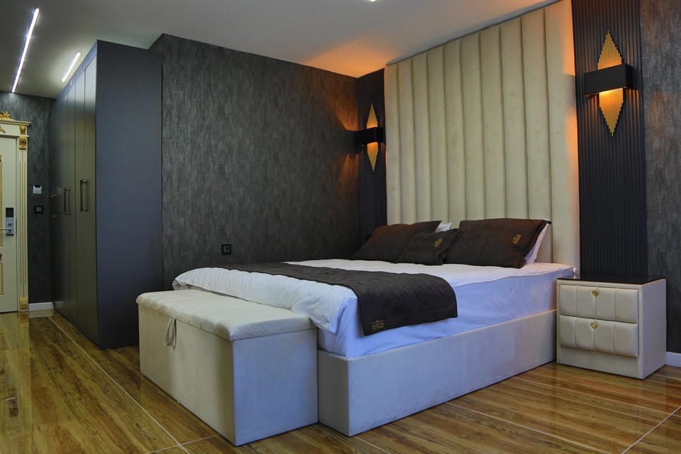 Family Room, Pool View | Free minibar, in-room safe, desk, iron/ironing board