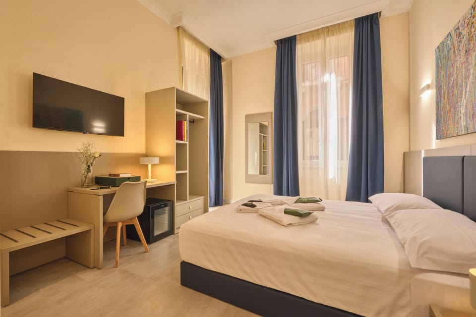 Family Double or Twin Room | In-room safe, desk, blackout drapes, soundproofing