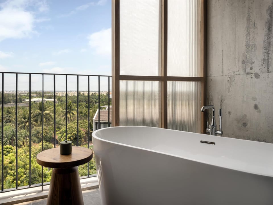 Premium Suite, 1 King Bed (Riverside View) | Bathroom | Shower, rainfall showerhead, free toiletries, hair dryer
