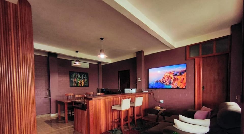 Premium House, Air conditioning, Lagoon View | Living area | 70-inch Smart TV with digital channels, Netflix, streaming services