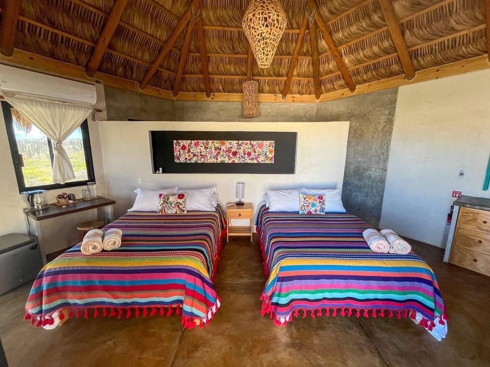 Basic Quadruple Room, Balcony, Desert View | Minibar, laptop workspace, WiFi (free), bed sheets