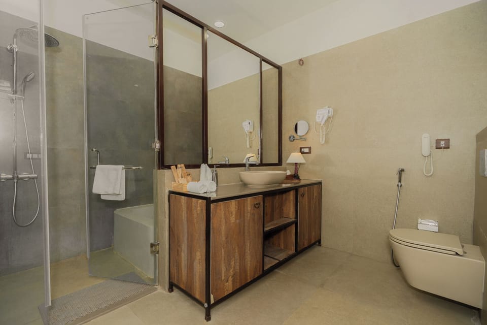 Shower, free toiletries, towels, toilet paper