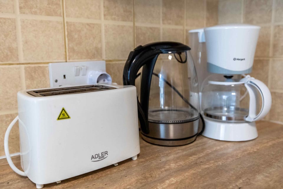 Apartment, 1 Bedroom, Kitchen, City View | Coffee and/or coffee maker