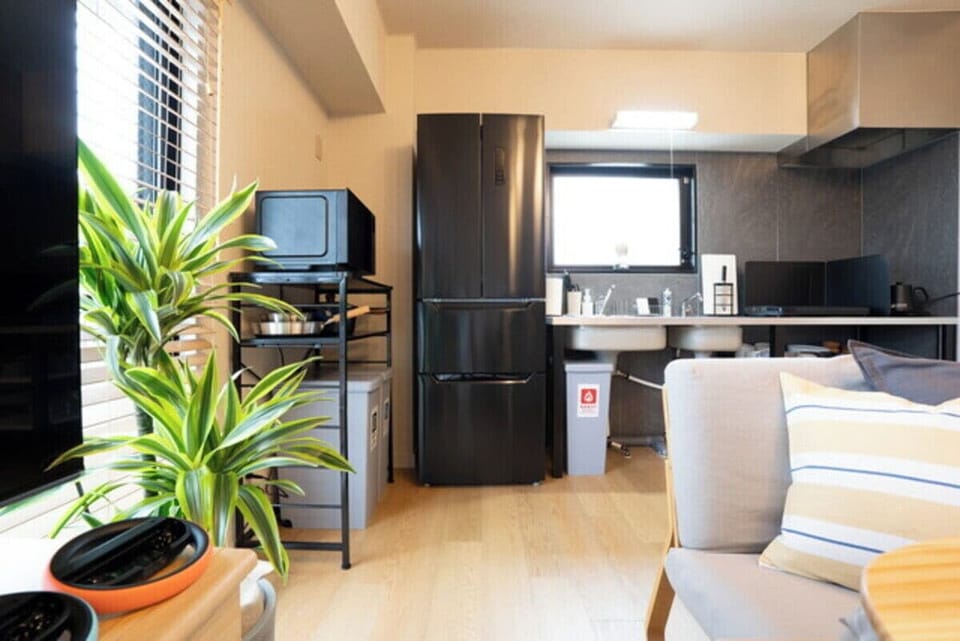 Comfort Apartment | Living area | 50-inch flat-screen TV with digital channels, video-game console